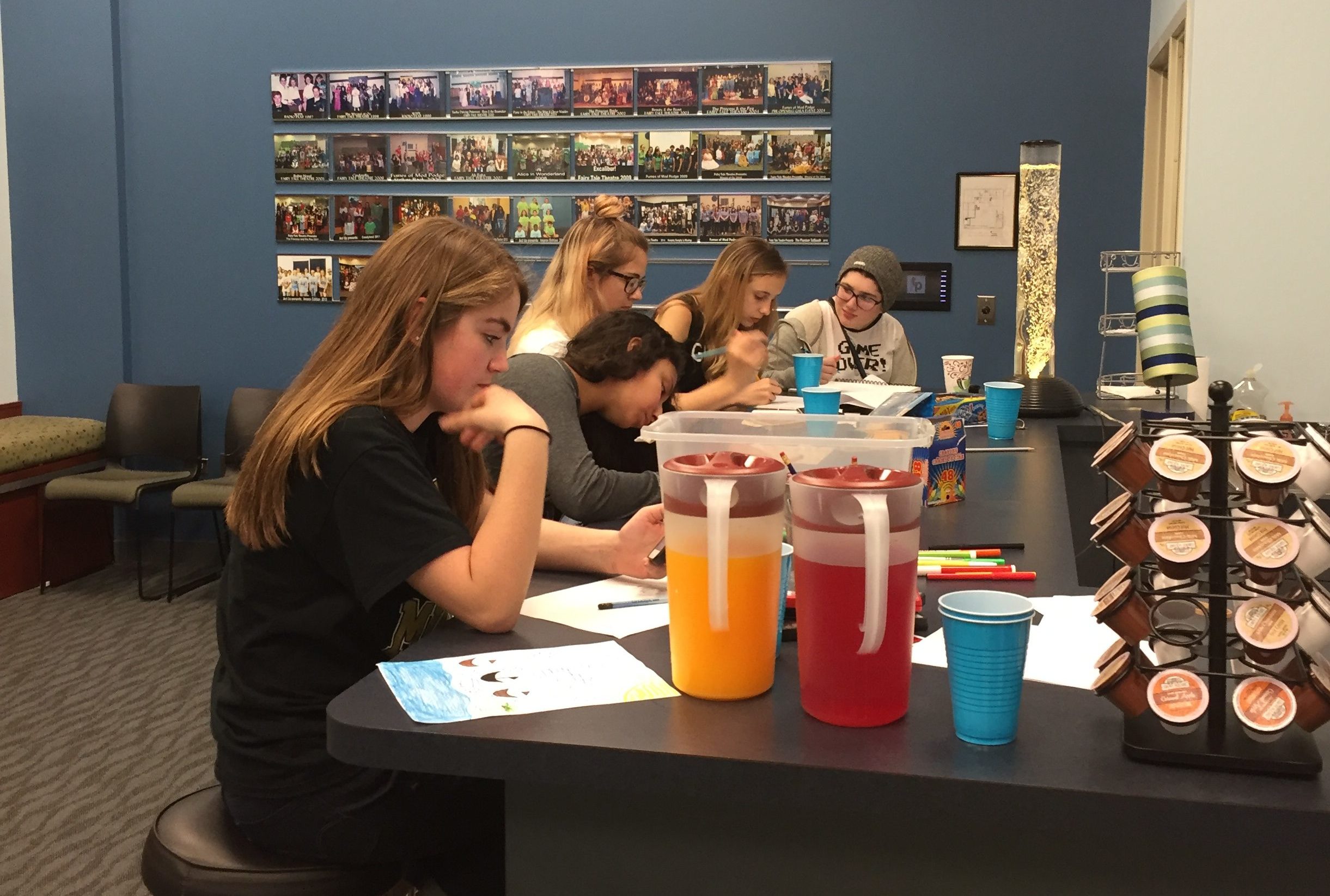 Teens playing a game at the library