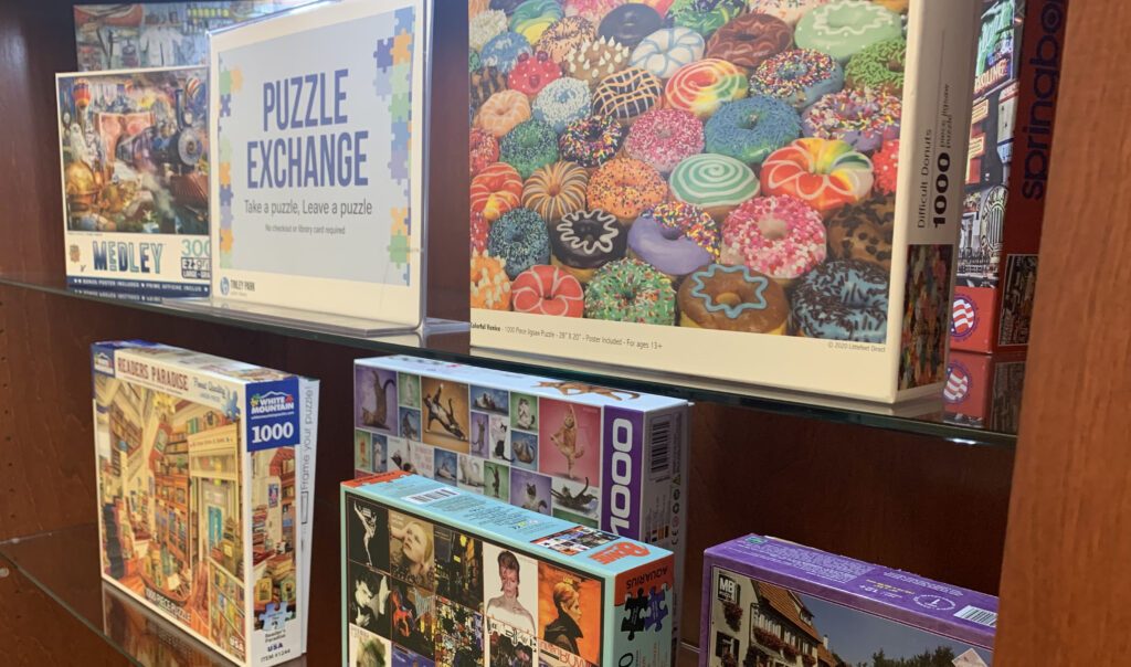 Puzzle Exchange shelves full of jigsaw puzzles