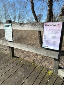 Signage on display at the 2023 Poetry Walk