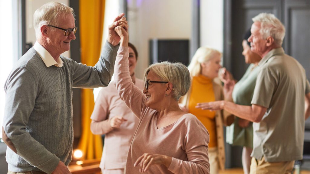 senior couples dancing and having a good time.