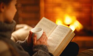 Lady being cozy with a book