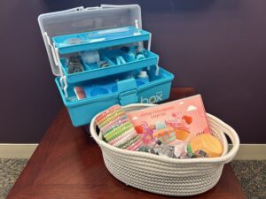 Prize bundle with a cake decorating kit, cupcake lines, food coloring, and cookie cutters