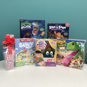 Prize bundle with Snack-o-Saurus Rex, Bluey Beat the Parents, Silly Poopy's Hide & Seek, Drone Home, Sink N' Sand Midnight Jungle, snack basket, and two Brookfield Zoo passes