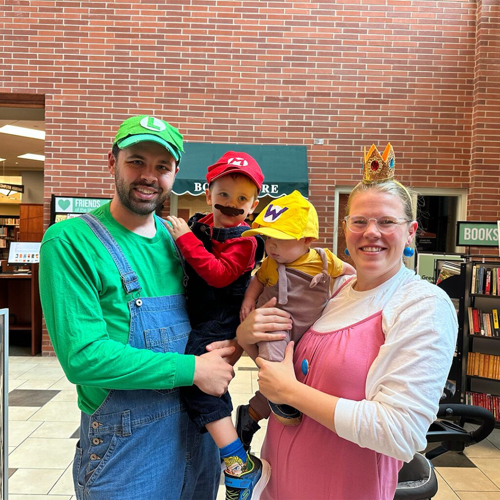 Family of four in their cosplay costumes