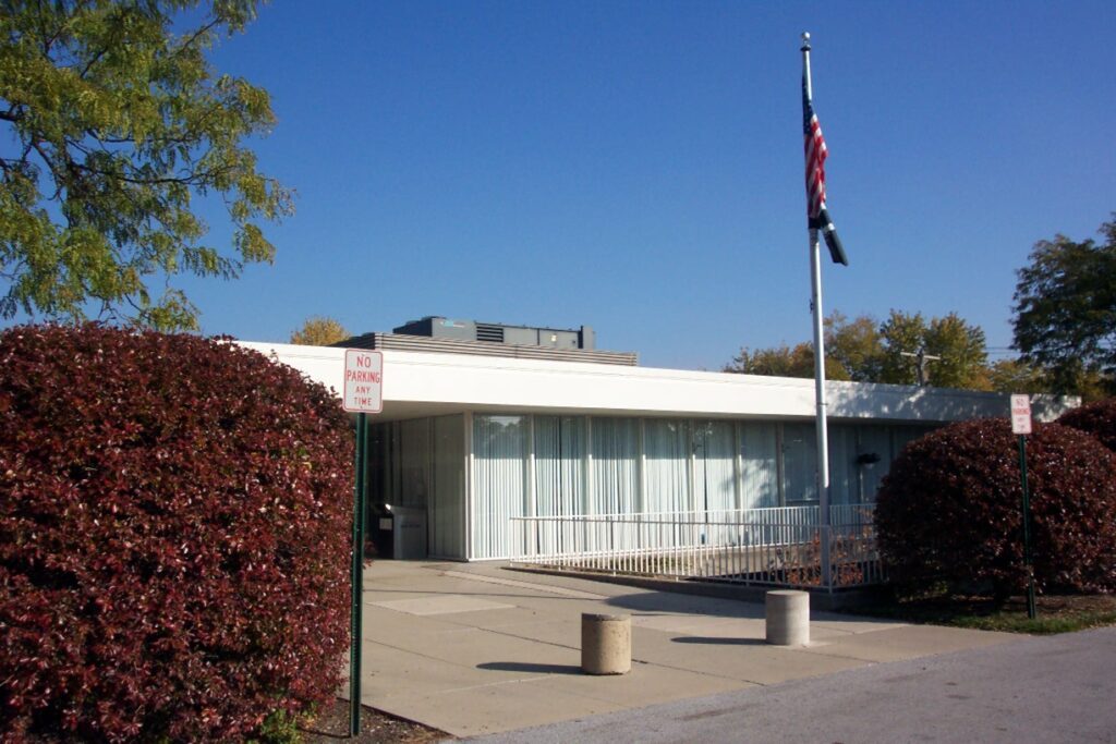 Color photograph of entrance to old library building at 17101 S 71st Ave, Tinley Park, IL