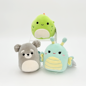 Three small Squishmallows - a dog, a dinosaur, and a butterfly
